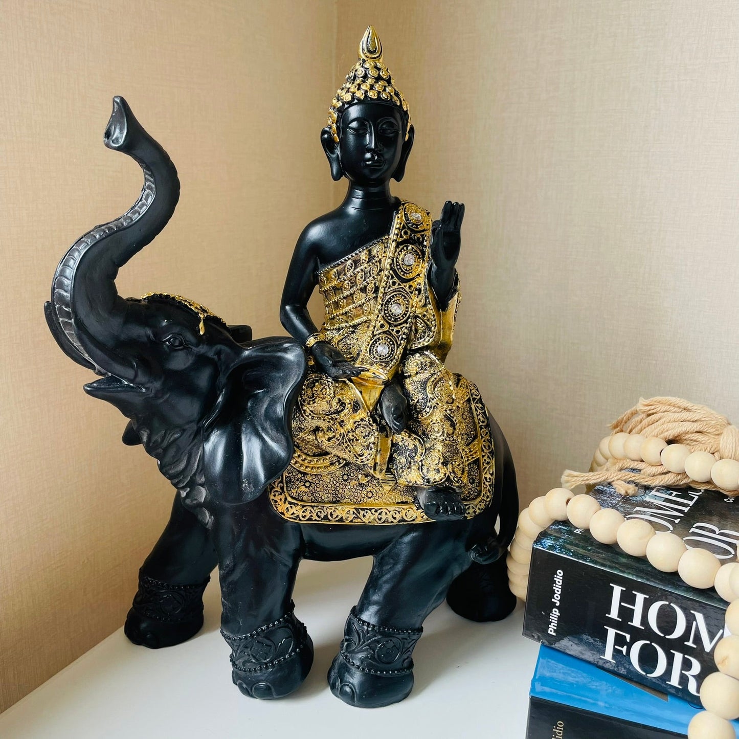 Buda sobre elefante de poliresina