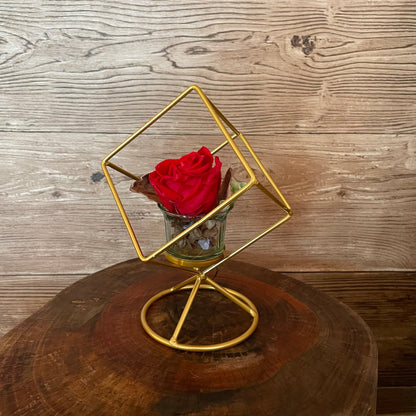 Rosa eterna con soporte dorado